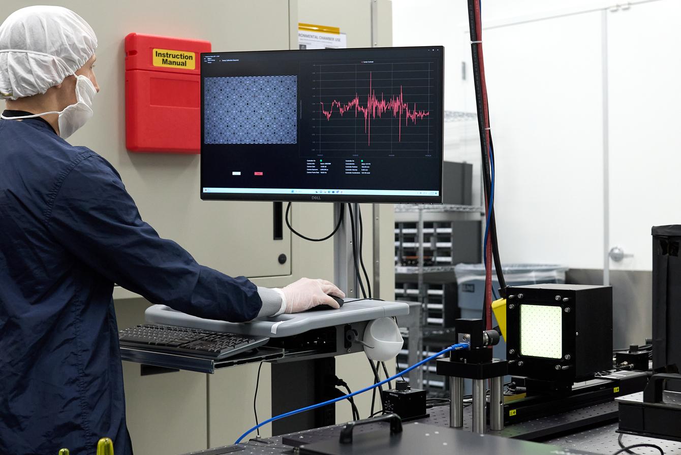 A Quartus employee uses a specialized testbed for calibration and checks to be sure that all overlapping target features have high contrast across the entire FOV.